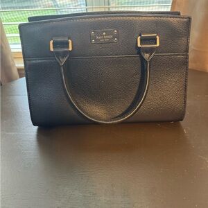 Kate Spade Black Satchel Bag with extra long handle to wear as a crossbody bag.